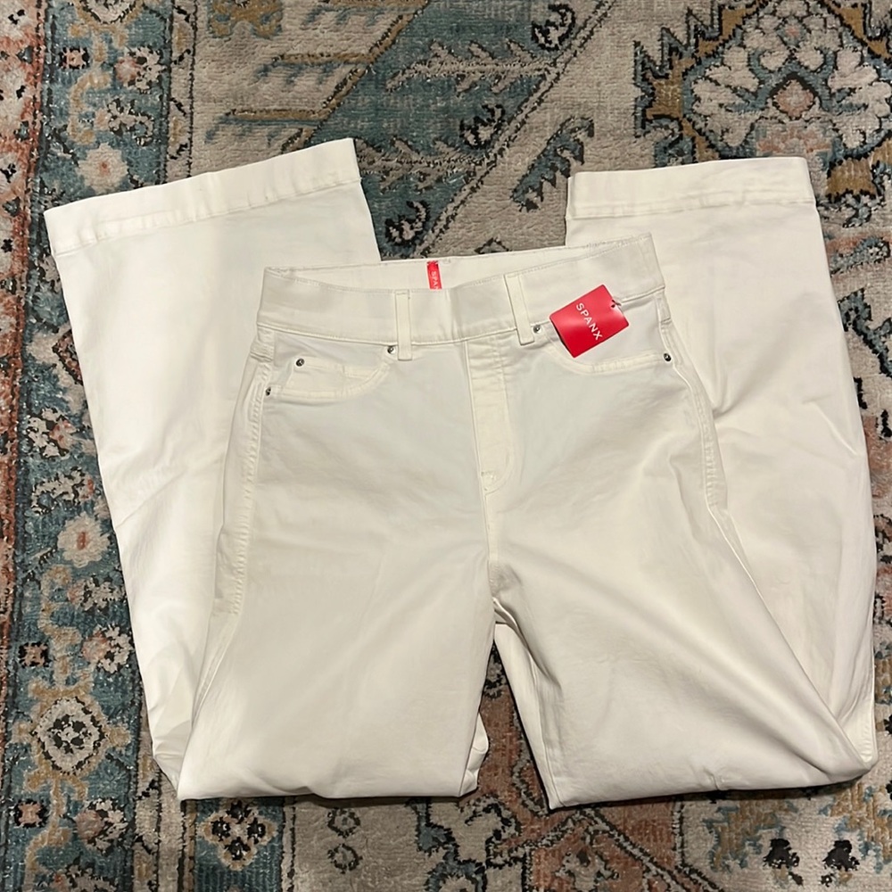 Spanks seamed front wide leg jeans.